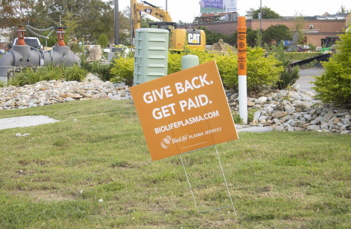 A sign informs students about donating plasma Monday, Oct. 4, 2021, outside the BioLife Plasma Services building on 11620 Coursey Blvd in Baton Rouge, La.