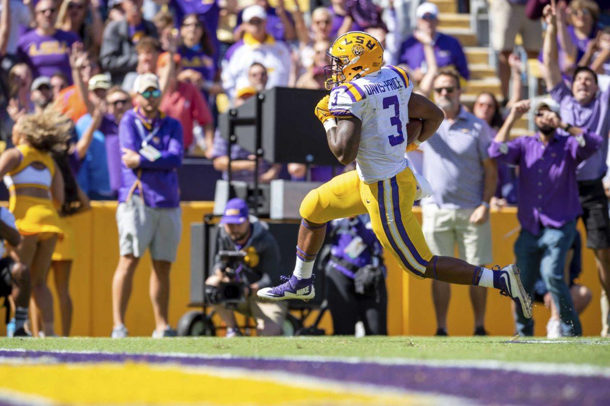 LSU's Tyrion Davis-Price scores a touchdown against Florida during an NCAA college football game, Saturday, Oct. 16, 2021, Baton Rouge, La. (Scott Clause/The Daily Advertiser via AP)