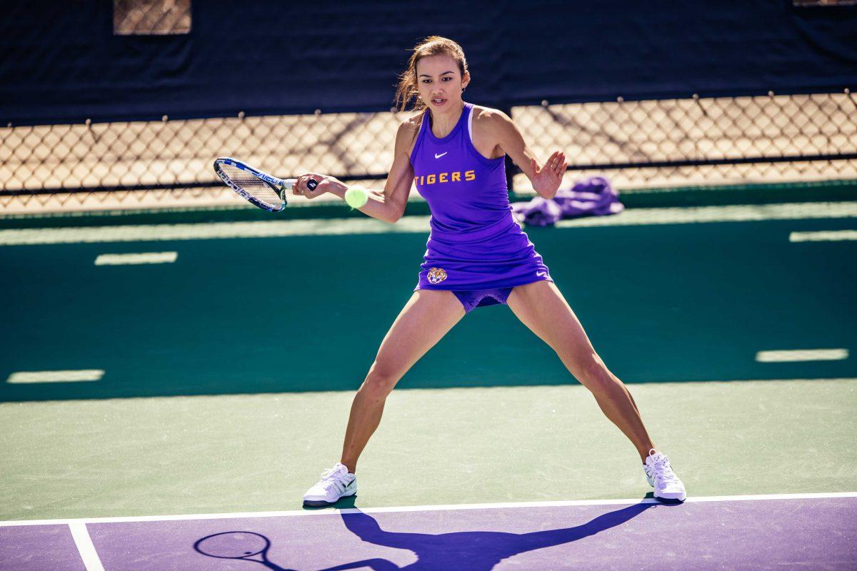 LSU women's tennis senior Taylor Bridges hits the ball Sunday, Jan. 31, 2021 during LSU's 4-0 win over Rice at the LSU Tennis Complex on Gourrier Avenue in Baton Rouge, La.