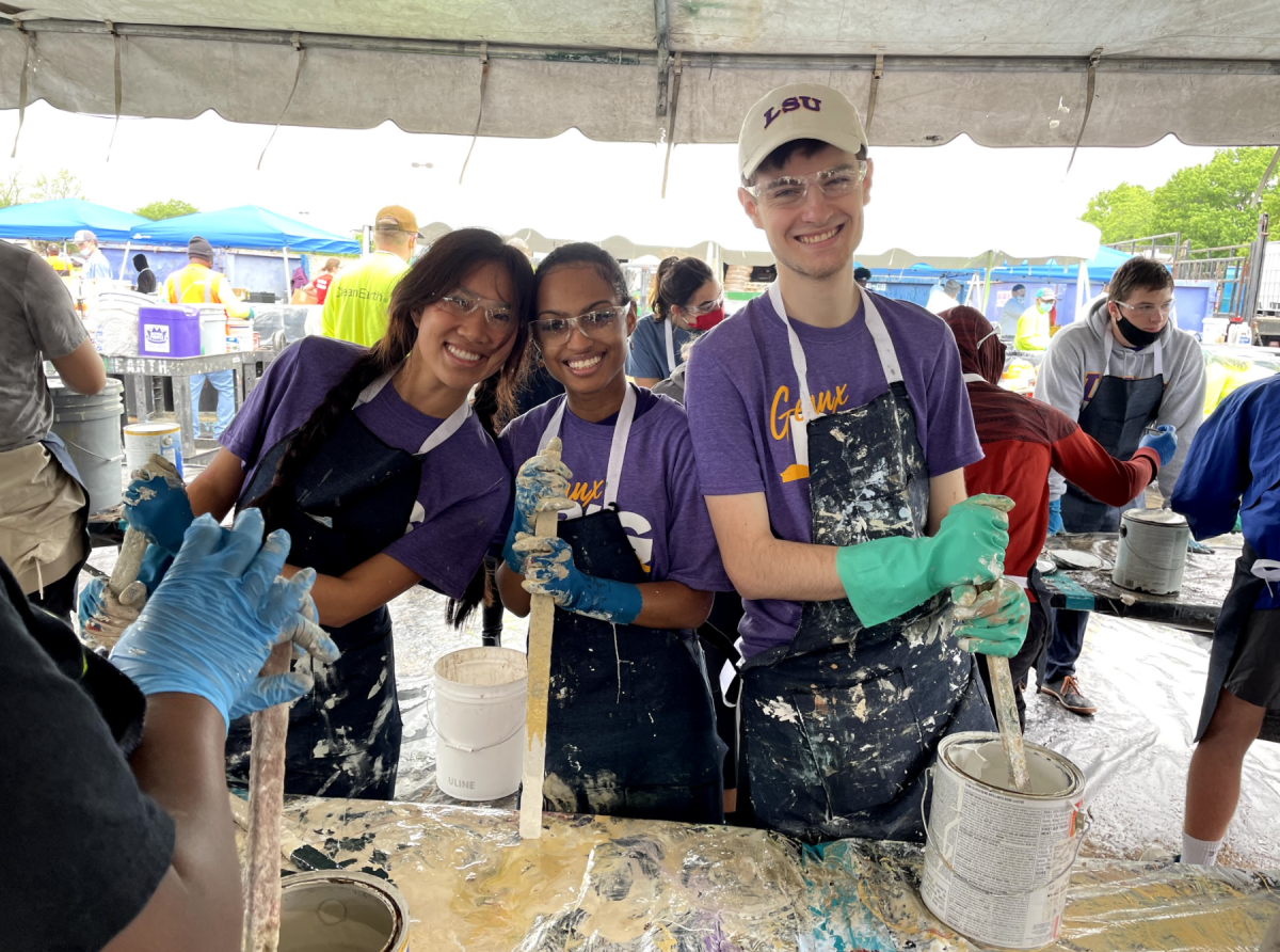 Luuanne Nguyen, Mya Dixon, and Daniel Sentilles work&#160;hard on mixing many paint buckets for Habitat of Humanity at Geaux Big Baton Rouge.