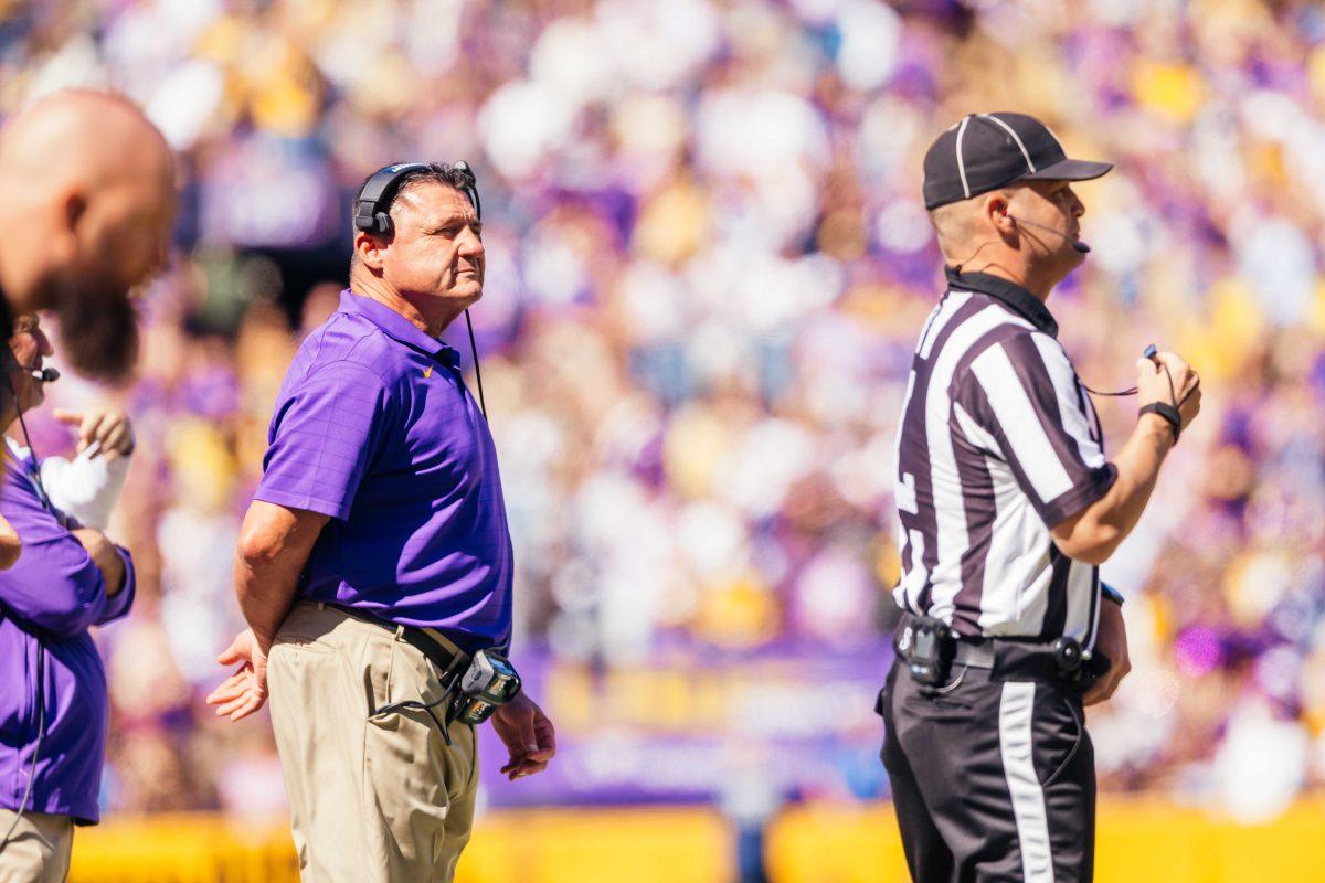 LSU head coach Ed Orgeron watches his team on the sidelines Saturday, Oct. 16, 2021, during LSU's 49-42 win against Florida at Tiger Stadium in Baton Rouge, La.