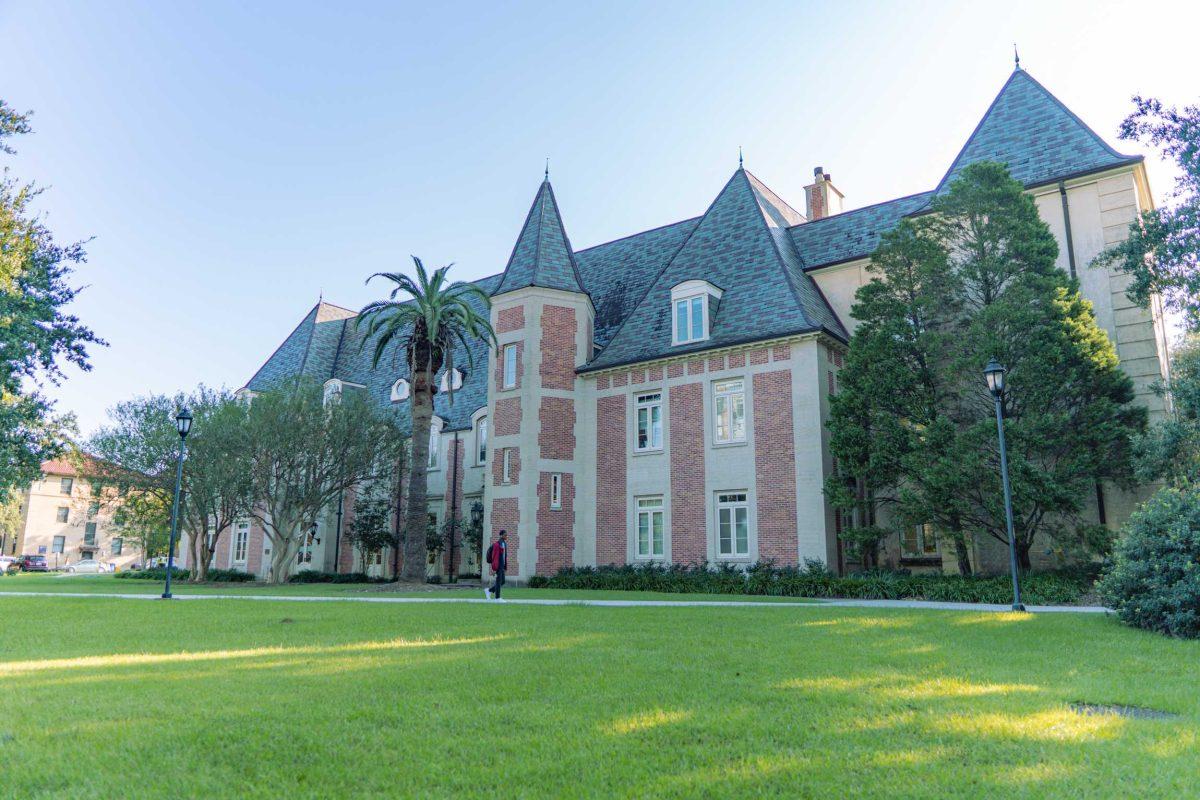 LSU students pass in front of the Roger Hadfield Ogden Honors College on Thursday, Oct. 7, 2021, on Highland Road in Baton Rouge, La.