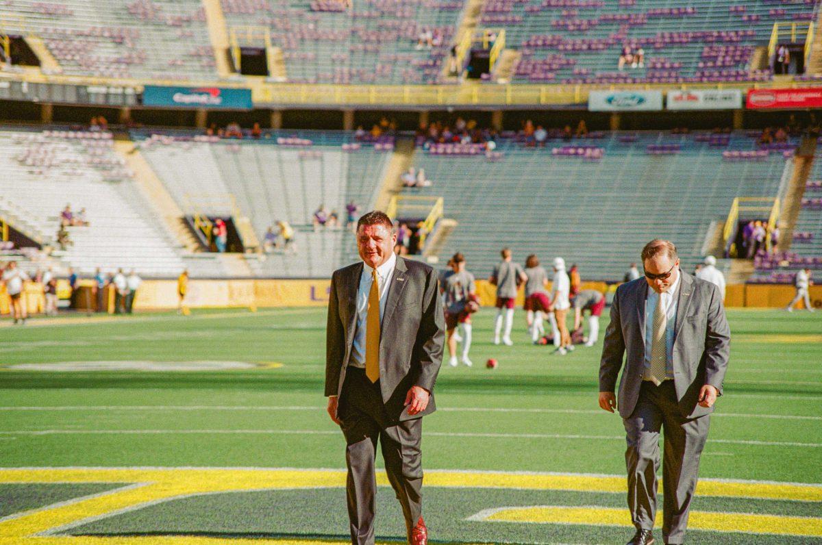 LSU football head coach Ed Orgeron walks across the endzone before kickoff on Saturday, Sept. 18, 2021, during LSU&#8217;s 49-21 victory over Central Michigan in Tiger Stadium in Baton Rouge, La.