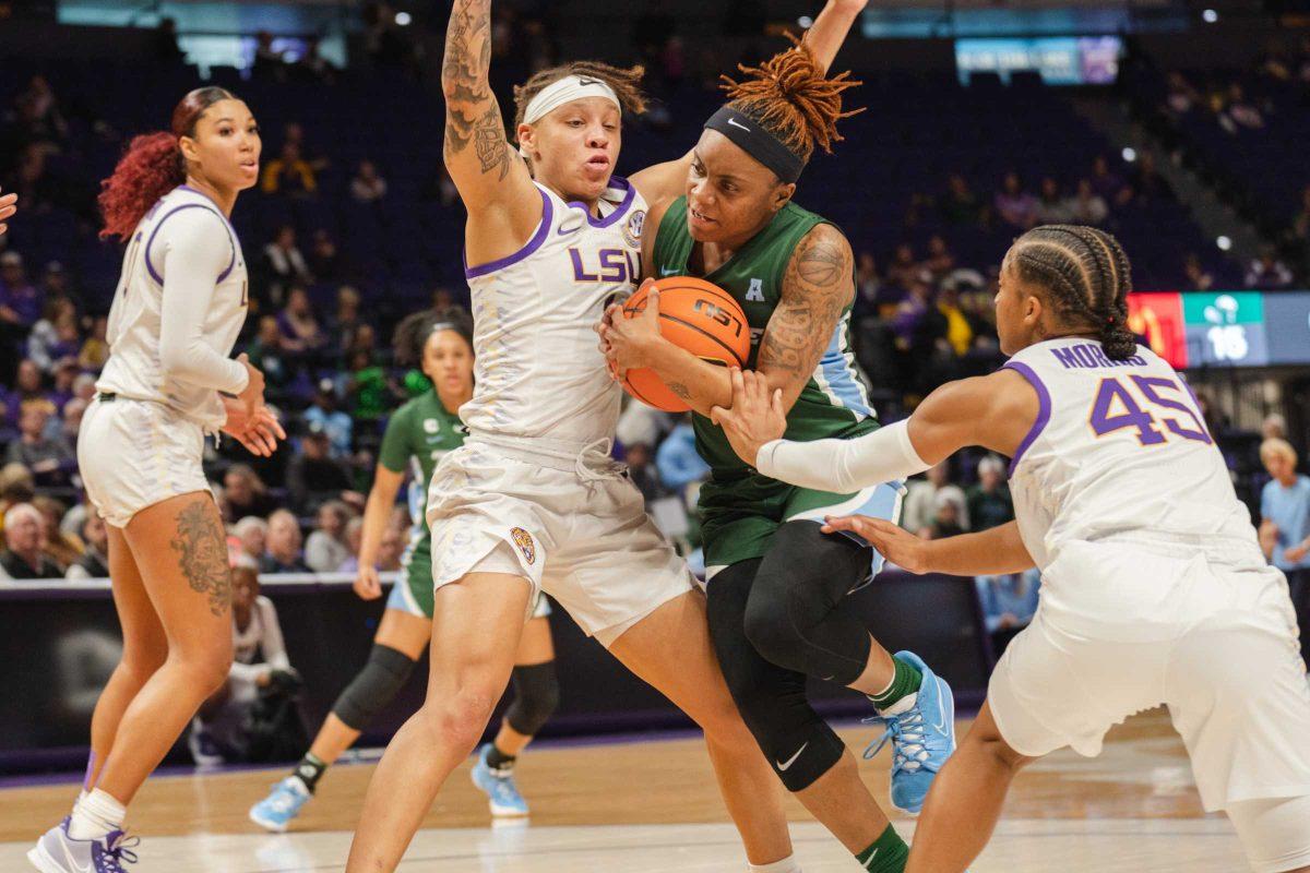 LSU women&#8217;s basketball graduate student guard Jailin Cherry (1) blocks a Tulane player on Tuesday, Nov. 23, 2021, during LSU&#8217;s 75-58 win over Tulane at the Pete Maravich Assembly Center in Baton Rouge, La.