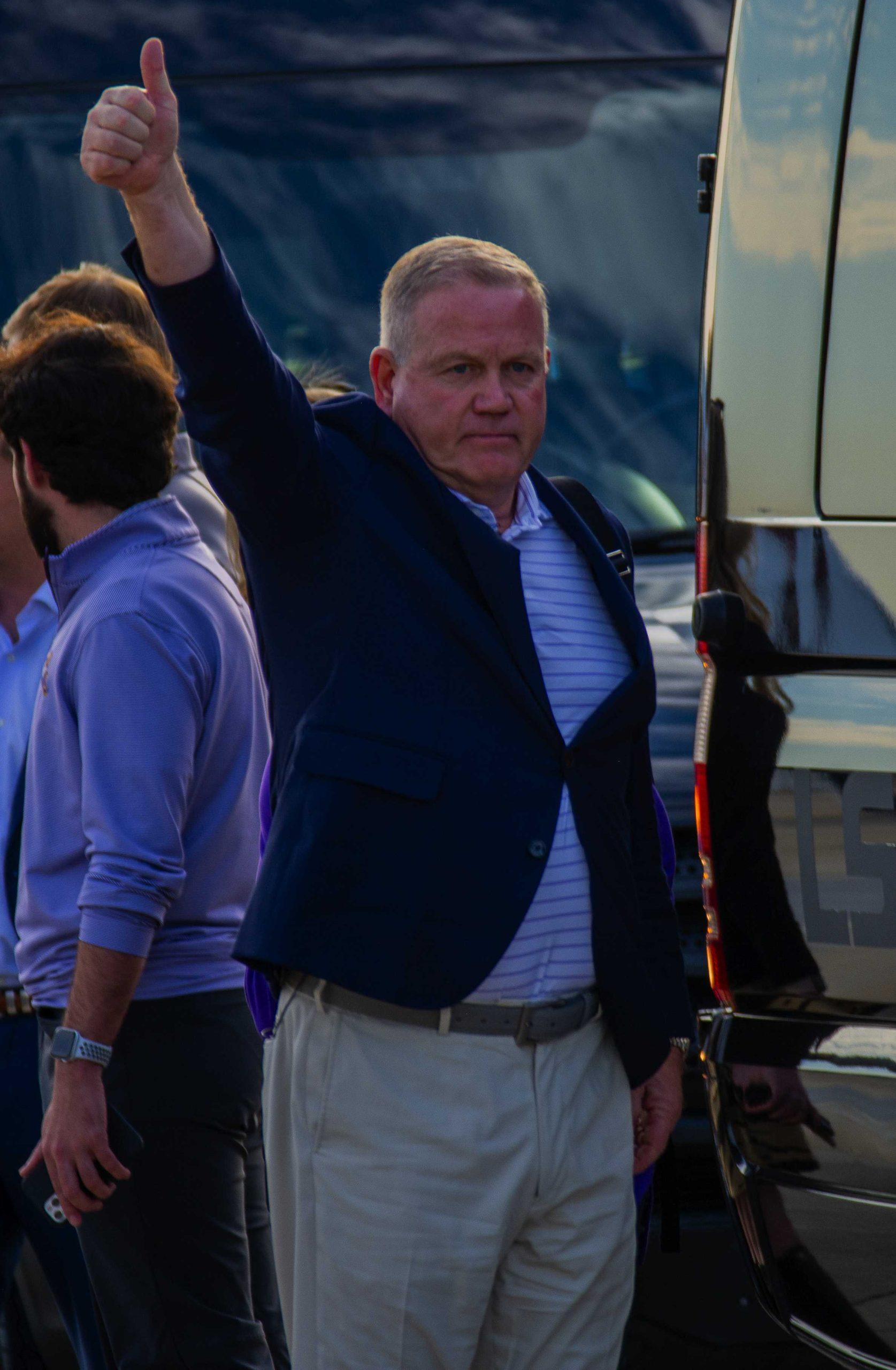 PHOTOS: Newly hired LSU football head coach Brian Kelly and family fly into Baton Rouge