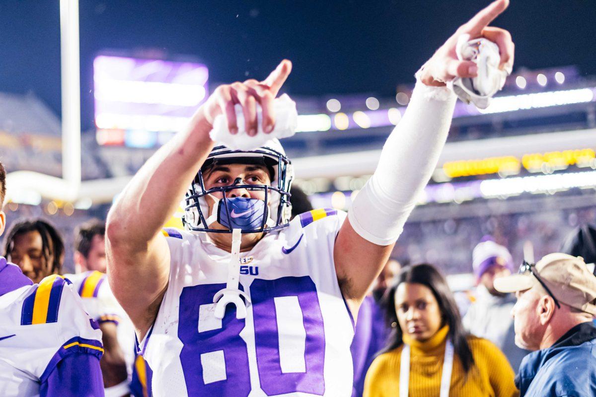 LSU football freshman wide receiver Jack Bech (80) points to the crowd Saturday, Nov. 27, 2021, after LSU's 27-24 win against Texas A&amp;M at Tiger Stadium in Baton Rouge, La.