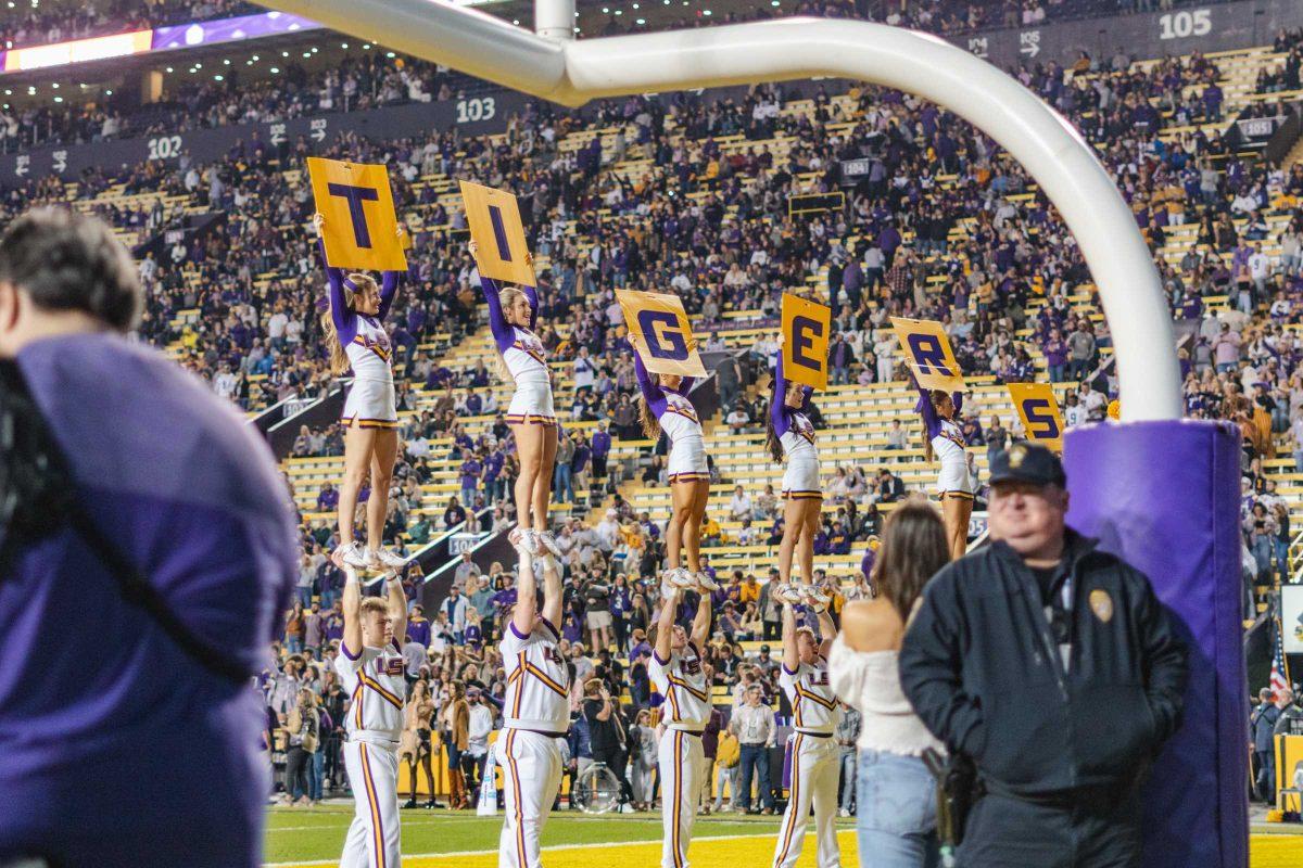 LSU cheerleaders spell out &#8220;TIGERS&#8221; to excite the crowd on Saturday, Nov. 20, 2021, during LSU&#8217;s 27-14 victory over ULM in Tiger Stadium in Baton Rouge, La.