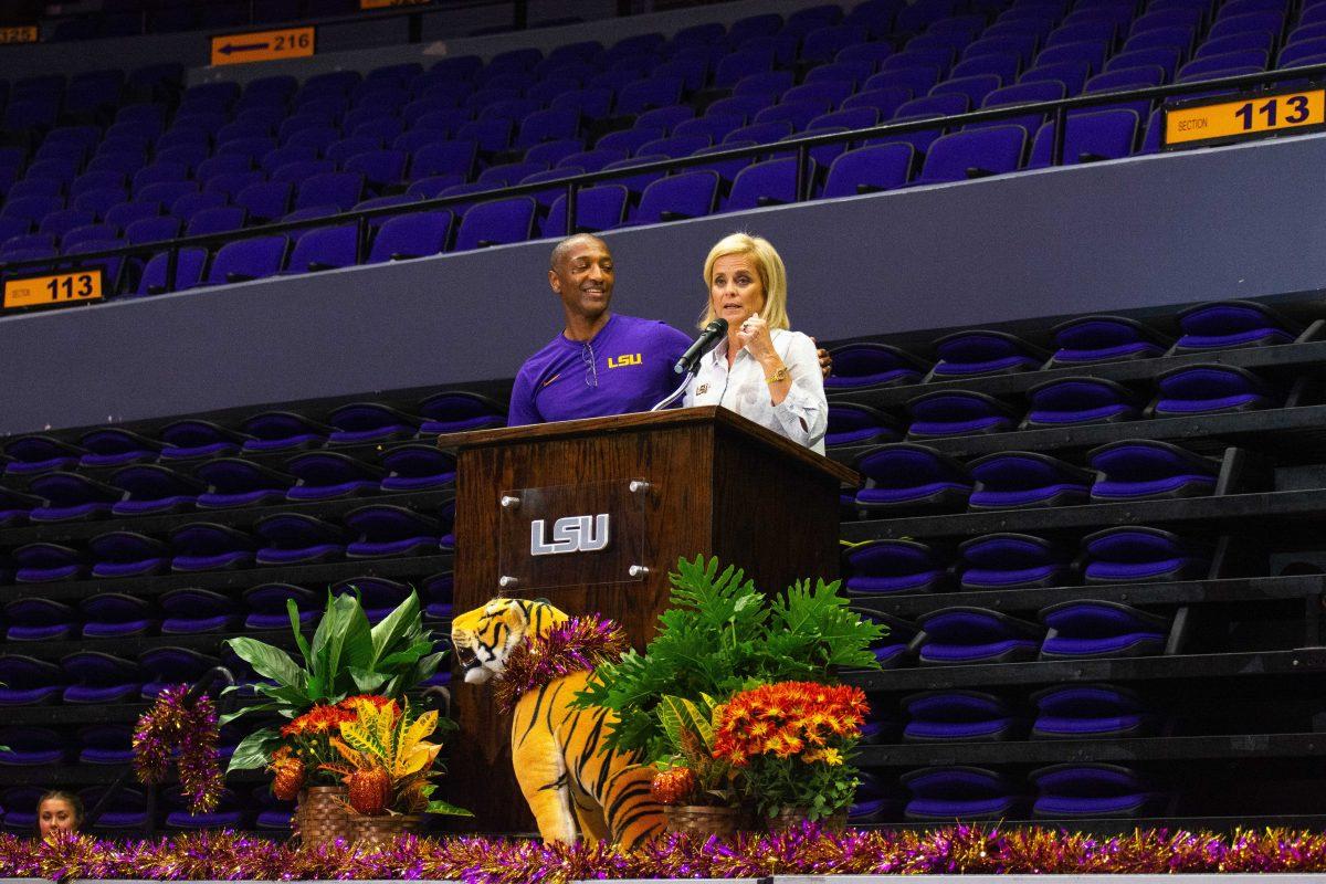 LSU president William F. Tate IV and coach Kim Mulkey stand together Tuesday, Oct. 26, 2021, during The Fast Break Club Kickoff event in the Pete Maravich Assembly Center on N. Stadium Drive in Baton Rouge, La.