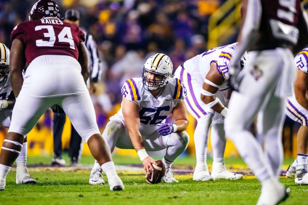 LSU football senior center Liam Shanahan (56) gets ready to throw the ball back Saturday, Nov. 27, 2021, during LSU's 27-24 win against Texas A&amp;M at Tiger Stadium in Baton Rouge, La.