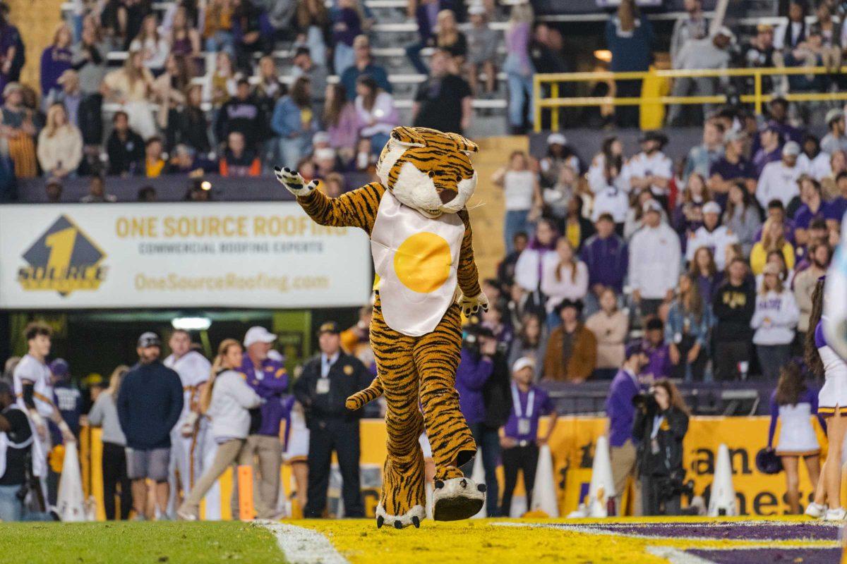 Mike the Tiger runs across the endzone in celebration on Saturday, Nov. 20, 2021, during LSU&#8217;s 27-14 victory over ULM in Tiger Stadium in Baton Rouge, La.