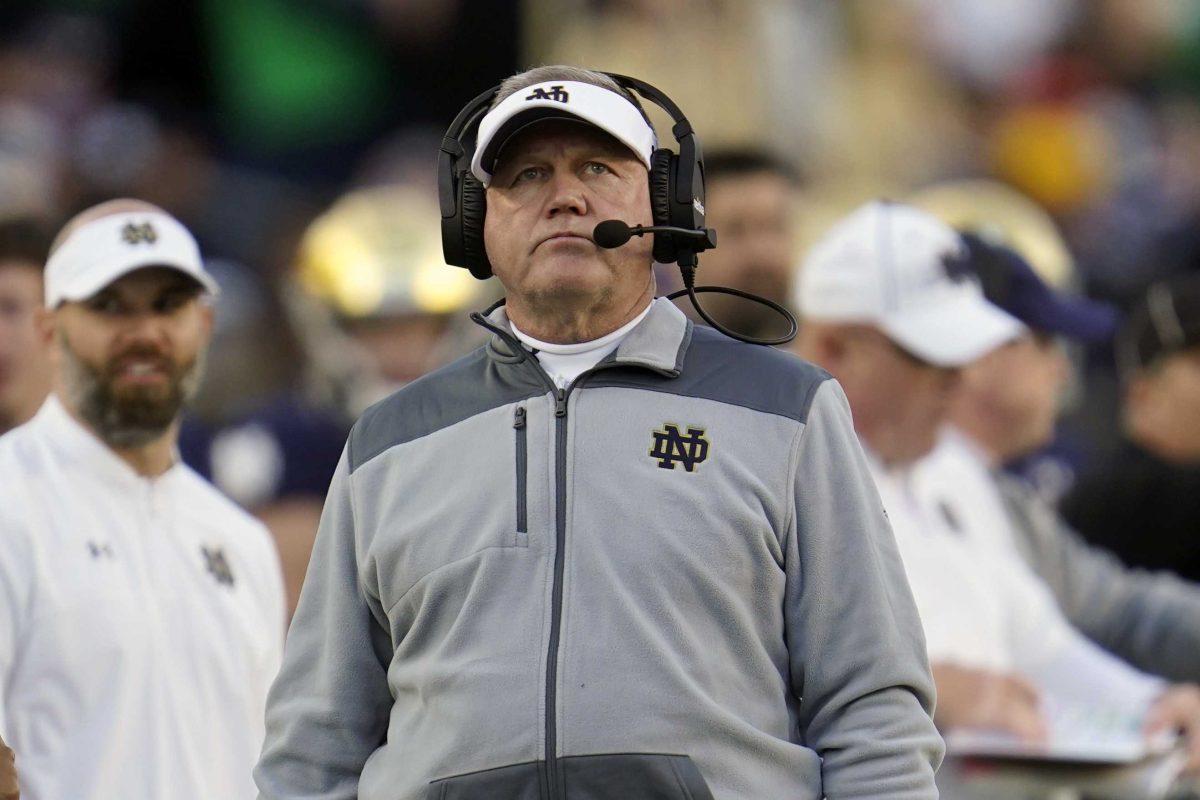 FILE - Notre Dame head coach Brian Kelly looks on during the second half of an NCAA college football game against Navy in South Bend, Ind., Nov. 6, 2021. LSU is hiring away from Notre Dame, a stunning move of one of the most accomplished coaches in college football jumping from the sport's most storied program to a Southeastern Conference powerhouse. (AP Photo/Paul Sancya, File)