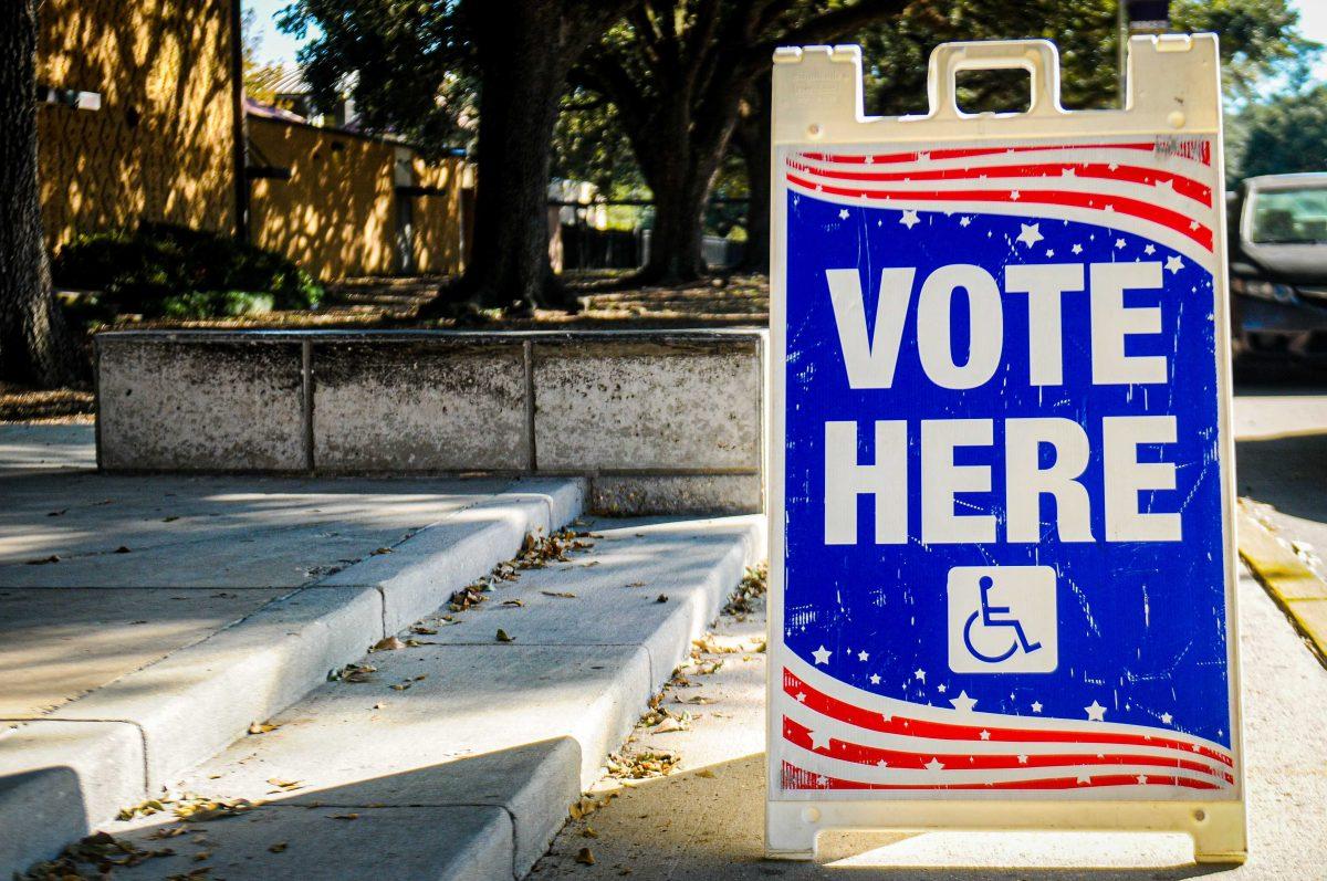 A voting sign sits on Tuesday, Nov. 3, 2020 at University Laboratory School polling location on 45 Dalrymple Dr.