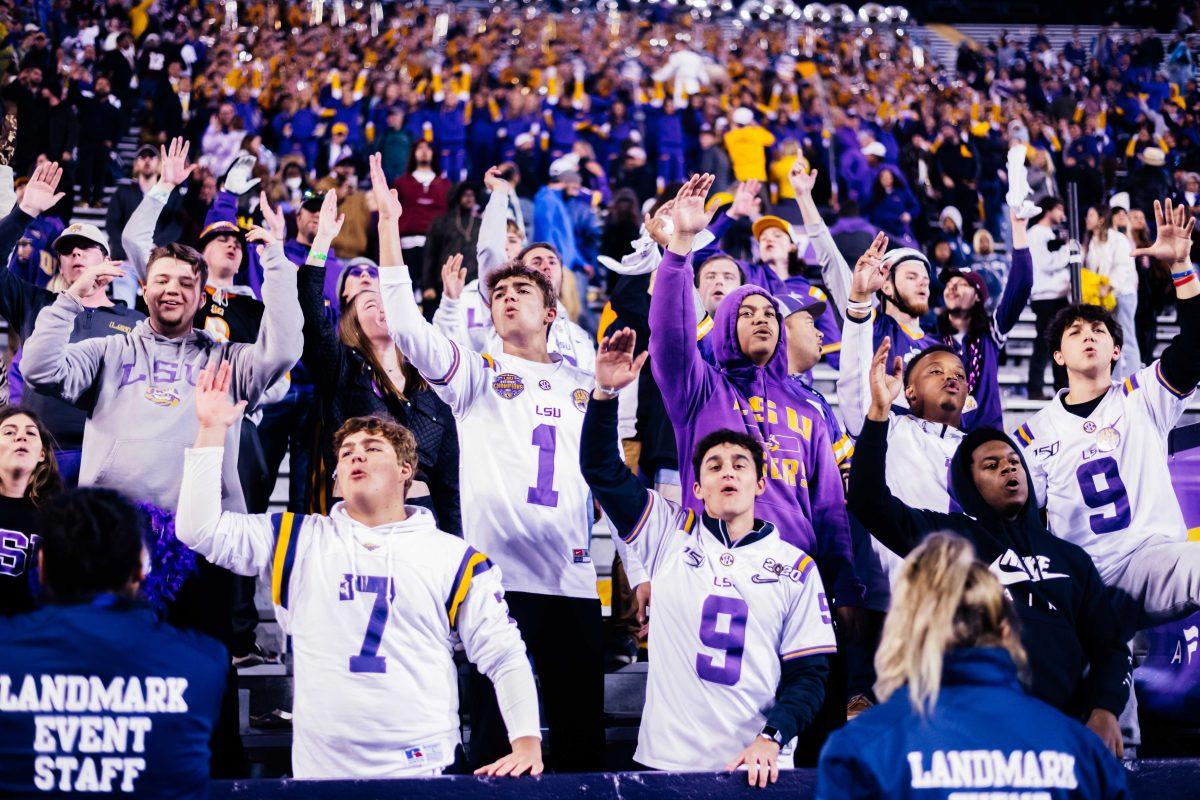 LSU football fans sing the lyrics of "Neck" Saturday, Nov. 27, 2021, during LSU's 27-24 win against Texas A&amp;M at Tiger Stadium in Baton Rouge, La.