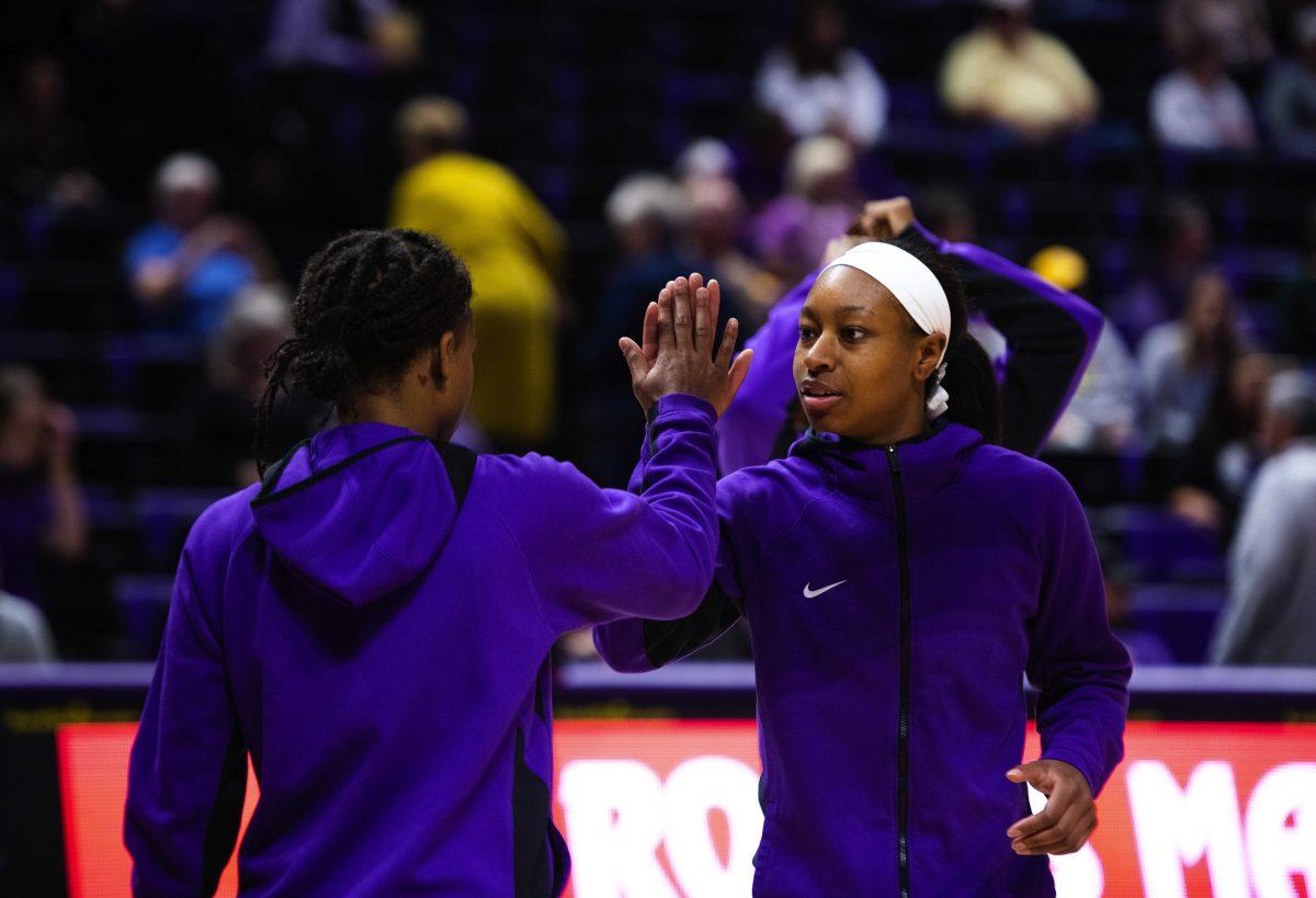 LSU women&#8217;s basketball graduate student guard Khayla Pointer (3) and fifth year senior guard Alexis Morris (45) perform a handshake Sunday, Nov. 14, 2021, before LSU&#8217;s 88-74 loss against Florida Gulf Coast in the Pete Maravich Assembly Center on North Stadium Drive in Baton Rouge, La.