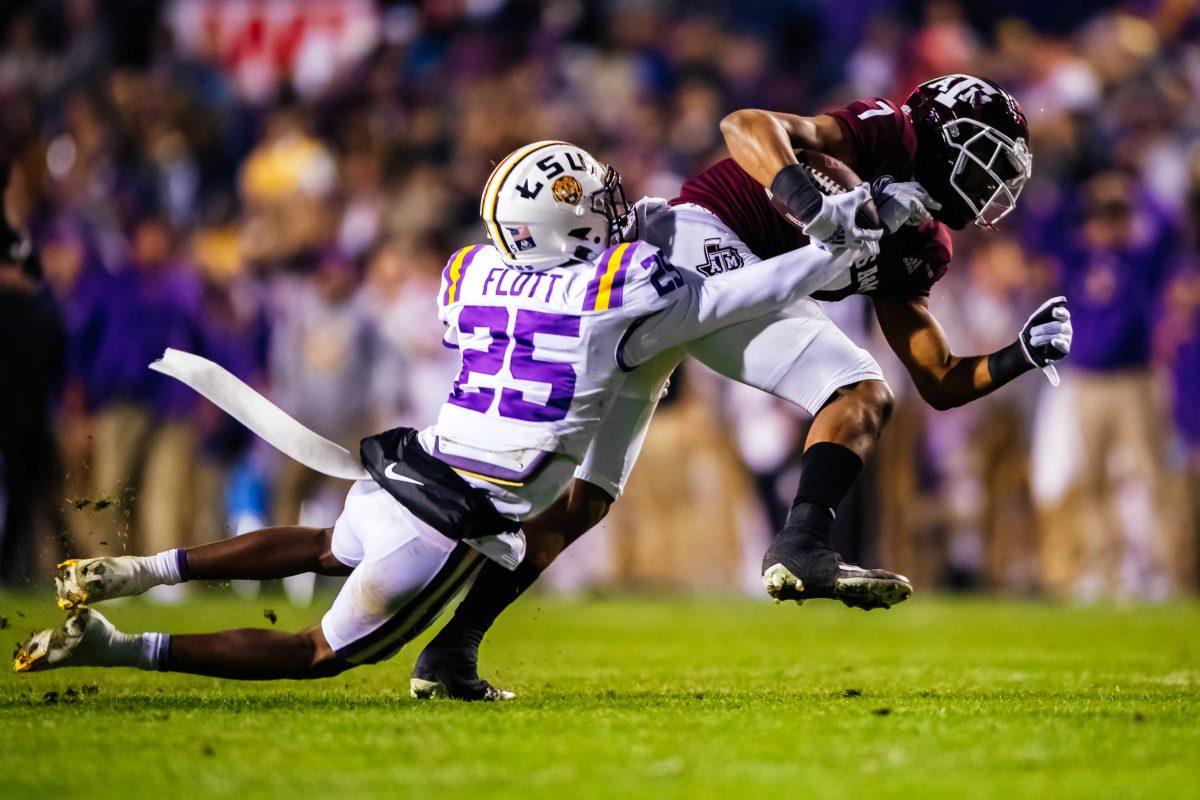 LSU football junior cornerback Cordale Flott (25) tackles Texas A&amp;M freshman wide receiver Moose Muhammad III (7) Saturday, Nov. 27, 2021, during LSU's 27-24 win against Texas A&amp;M at Tiger Stadium in Baton Rouge, La.