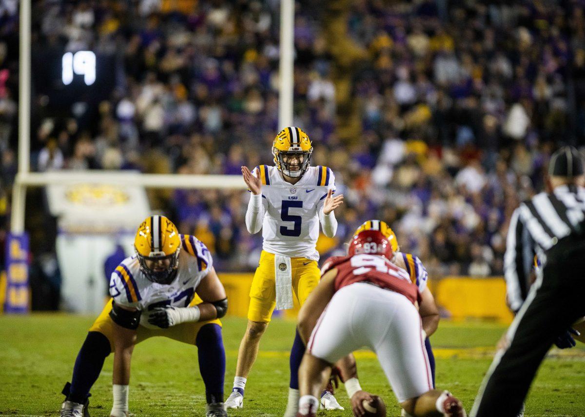 LSU football freshman quarterback Garrett Nussmeier (5) claps for the ball Saturday, Nov. 14, 2021, during LSU&#8217;s 16-13 loss against Arkansas at Tiger Stadium in Baton Rouge, La.