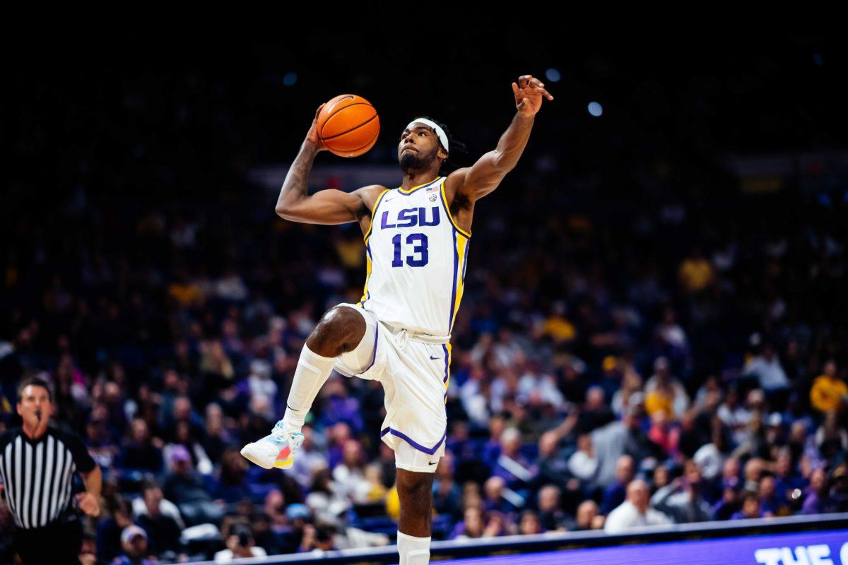 LSU men's basketball sophomore forward Tari Eason (13) attempts to shoot Monday, Nov. 22, 2021, after stealing the ball during LSU's 83-53 win over Belmont in the Pete Maravich Assembly Center in Baton Rouge, La.