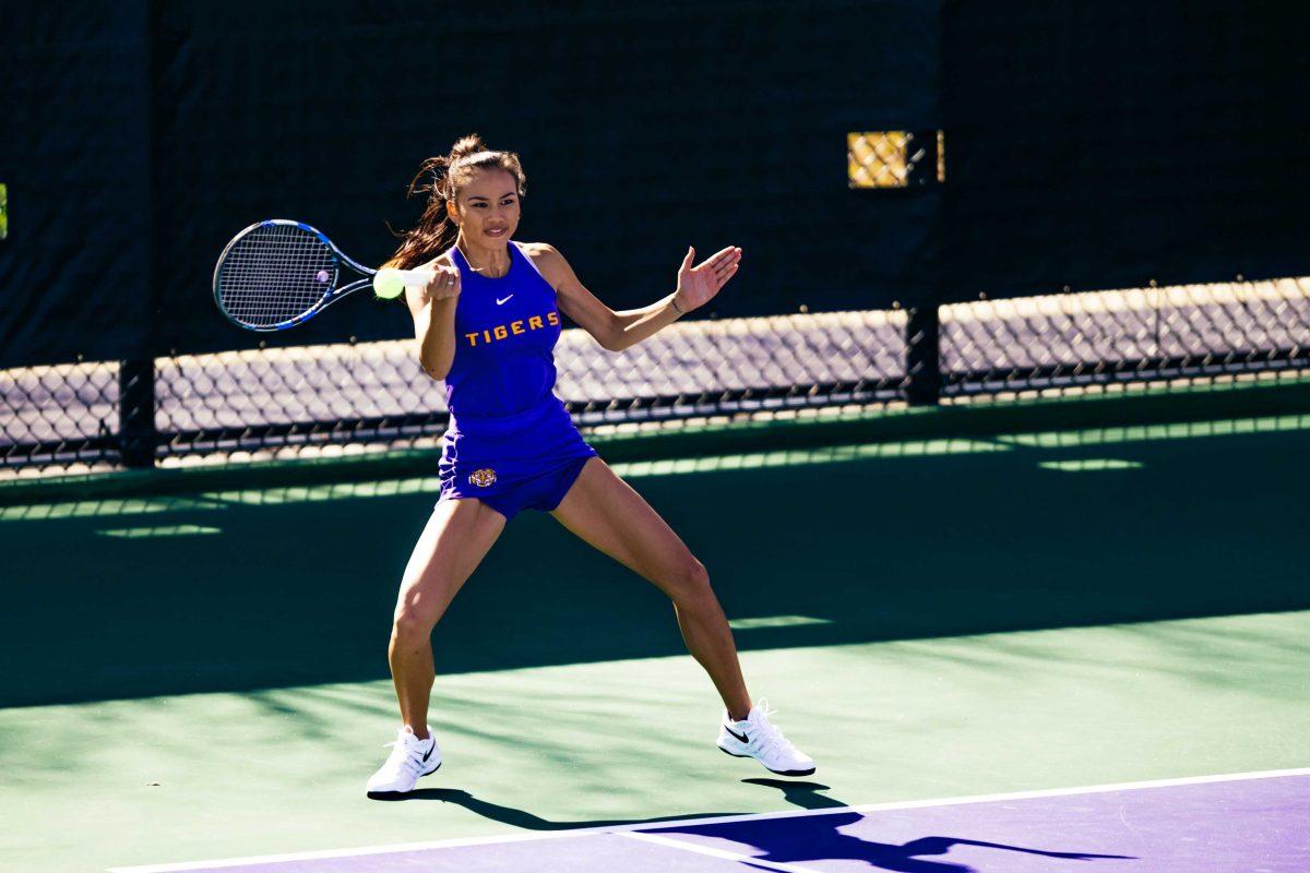 LSU women's tennis senior Taylor Bridges hits the ball Sunday, Jan. 31, 2021 during LSU's 4-0 win over Rice at the LSU Tennis Complex on Gourrier Avenue in Baton Rouge, La.