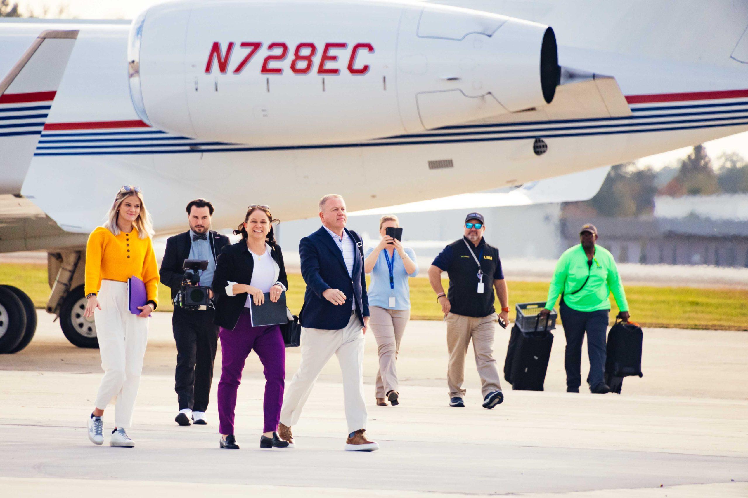 PHOTOS: Newly hired LSU football head coach Brian Kelly and family fly into Baton Rouge