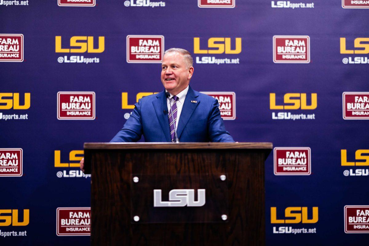 Brian Kelly smiles Wednesday, Dec. 1, 2021, during a press conference held in regard to his recent hire as LSU football's new head coach at the Bill Lawton Room in Tiger Stadium in Baton Rouge, La.