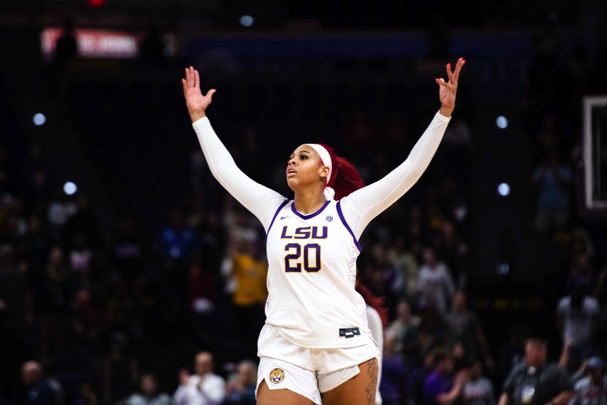 LSU women&#8217;s basketball sophomore center Hannah Gusters (20) raises her hands in celebration after scoring Thursday, Dec. 02, 2021, during LSU&#8217;s 69-60 win against Iowa State in the Pete Maravich Assembly Center on North Stadium Drive in Baton Rouge, La.