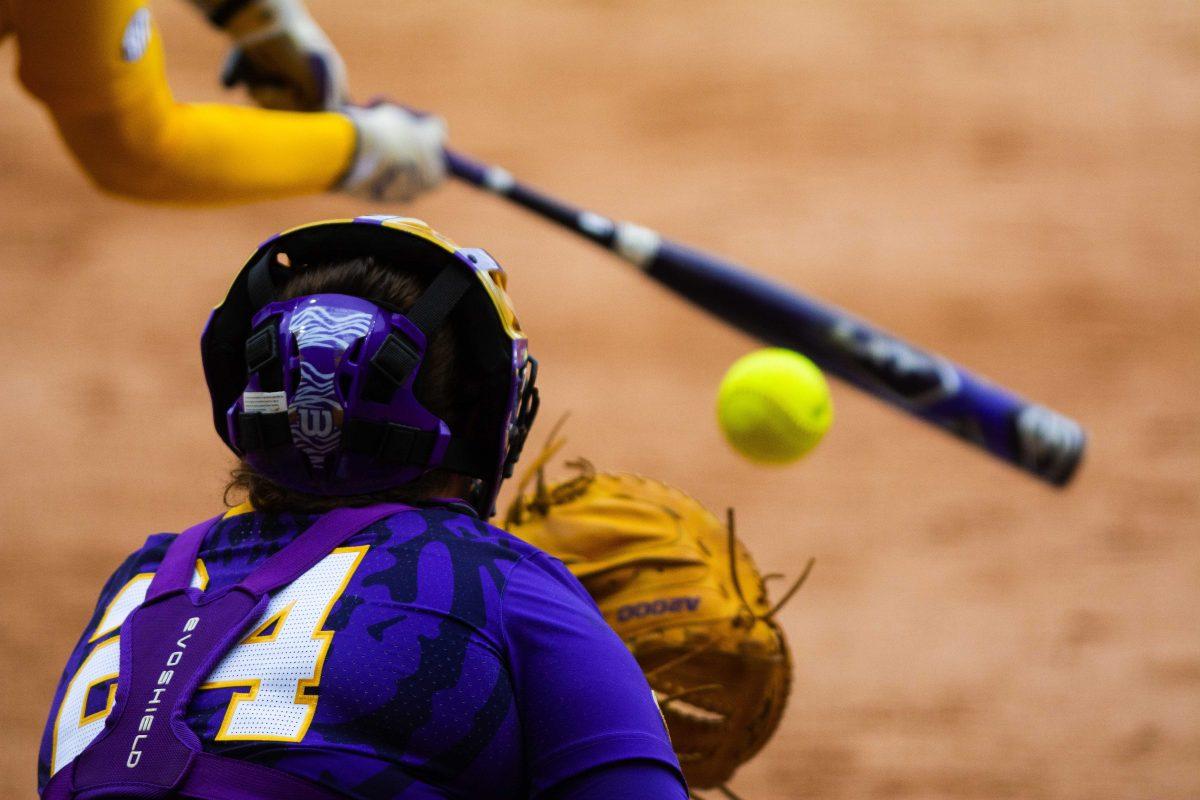 LSU softball catcher Hayden Brown (24) catches a strikeout during the Purple and Gold World Series on Thursday, Nov. 18, 2021, at Tiger Park in Baton Rouge, La.