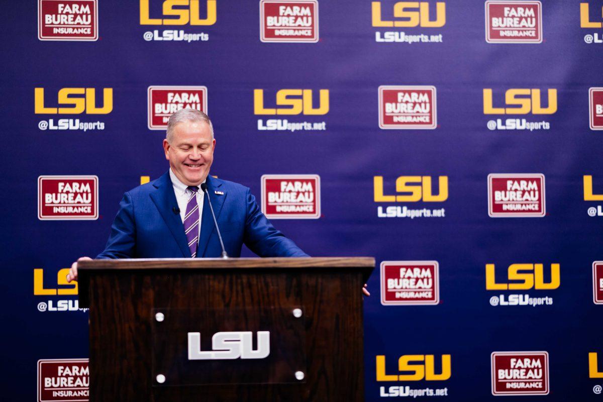 Brian Kelly smiles Wednesday, Dec. 1, 2021, during a press conference held in regard to his recent hire as LSU football's new head coach at the Bill Lawton Room in Tiger Stadium in Baton Rouge, La.