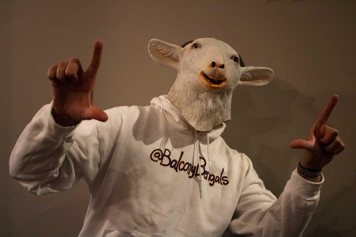 Goat Man holds up "L's" to show support for LSU.