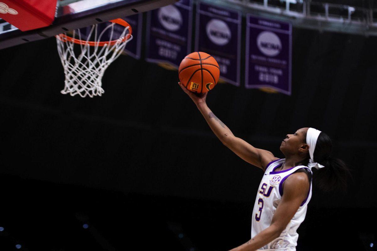 LSU women’s basketball graduate student guard Khayla Pointer (3) rises up for a layup Thursday, Jan. 13, 2022, during LSU’s 87-85 overtime win against Missouri in the Pete Maravich Assembly Center on North Stadium Drive in Baton Rouge, La.