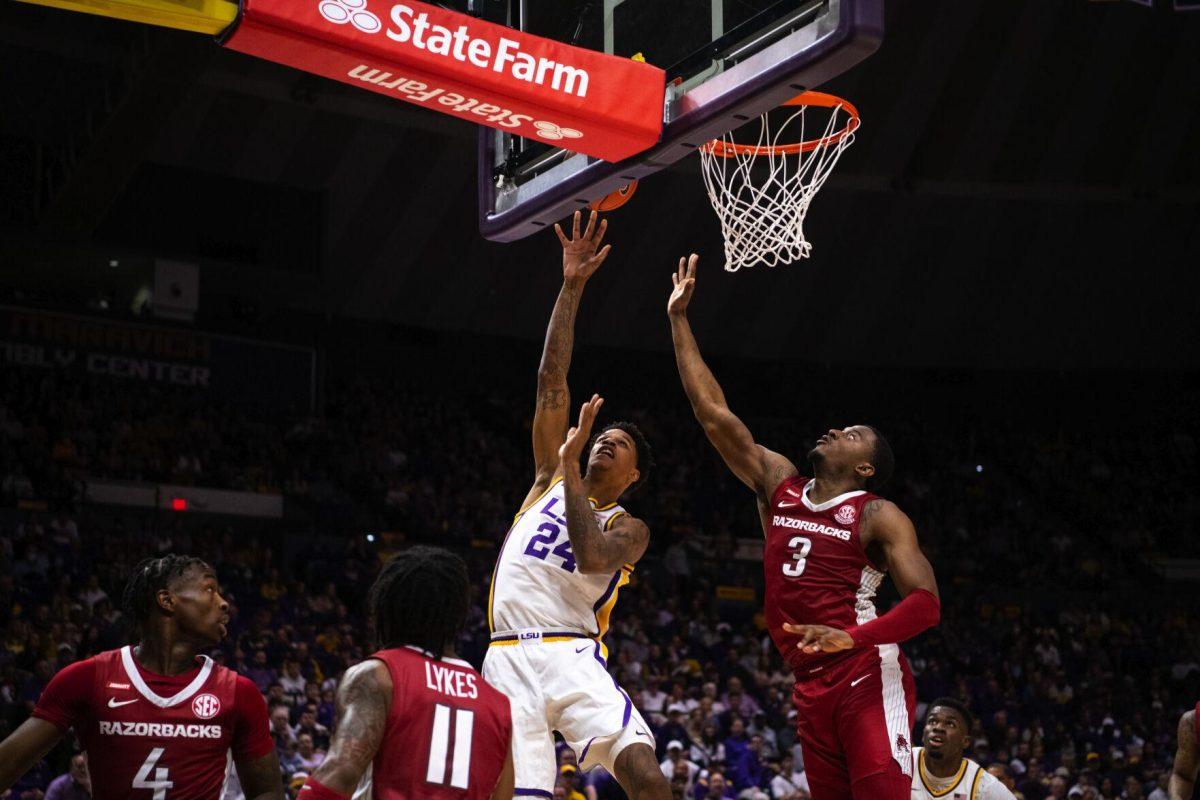 LSU men’s basketball junior forward Shareef O’Neal (24) goes up for a layup Saturday, Jan. 15, 2022, during LSU’s 65-58 loss against Arkansas in the Pete Maravich Assembly Center on North Stadium Drive in Baton Rouge, La.