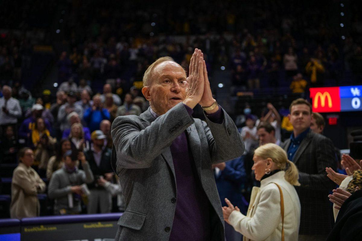 Longtime LSU basketball coach Dale Brown shows gratitude to the fans Tuesday, Jan. 04, 2022, before LSU&#8217;s 56-50 win against Kentucky in the Pete Maravich Assembly Center on North Stadium Drive in Baton Rouge, La.