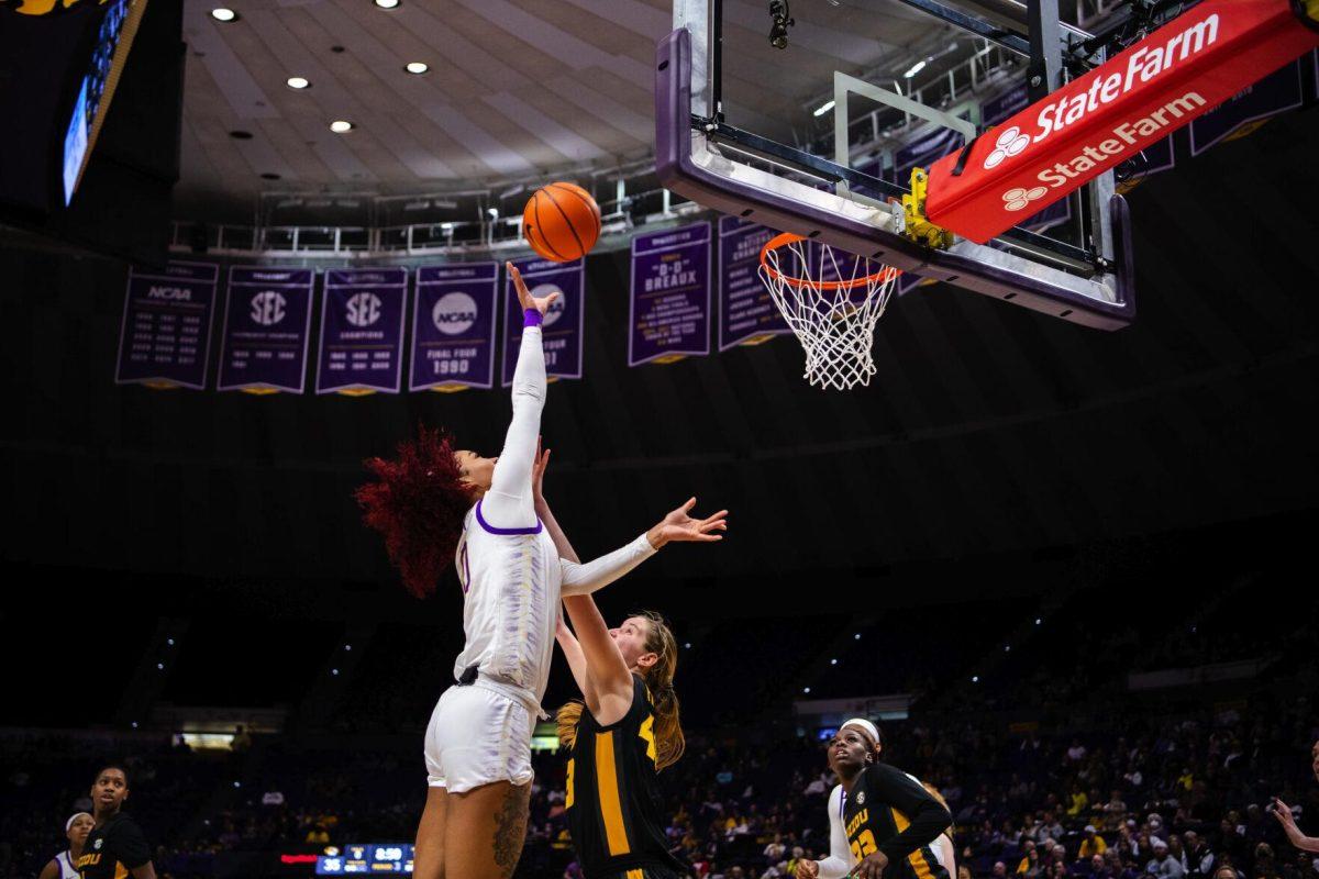 LSU women’s basketball graduate student forward Autumn Newby (0) shoots over a Missouri defender Thursday, Jan. 13, 2022, during LSU’s 87-85 overtime win against Missouri in the Pete Maravich Assembly Center on North Stadium Drive in Baton Rouge, La.