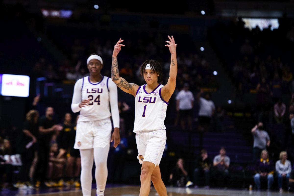 LSU women’s basketball graduate student guard Jailin Cherry (1) raises her hands up in celebration Thursday, Jan. 13, 2022, during LSU’s 87-85 overtime win against Missouri in the Pete Maravich Assembly Center on North Stadium Drive in Baton Rouge, La.