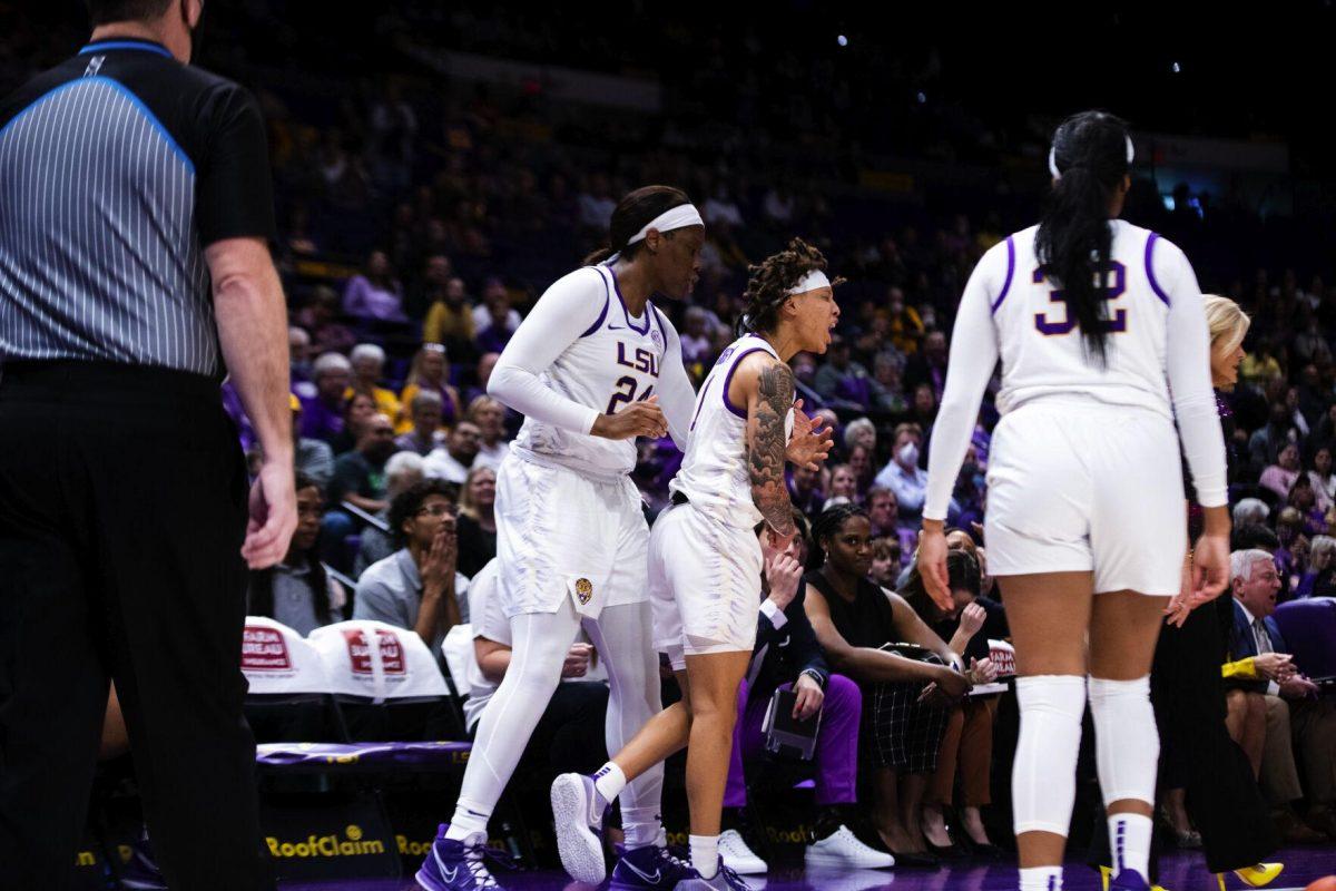 LSU women’s basketball graduate student center Faustine Aifuwa (24) attempts to calm down graduate student guard Jailin Cherry (1) after she commits a turnover Thursday, Jan. 13, 2022, during LSU’s 87-85 overtime win against Missouri in the Pete Maravich Assembly Center on North Stadium Drive in Baton Rouge, La.