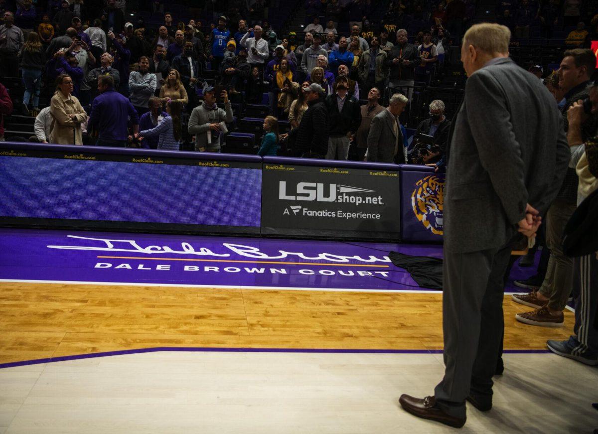 Longtime LSU basketball coach Dale Brown watches the unveiling of his name on the &#8220;Dale Brown Court&#8221; Tuesday, Jan. 04, 2022, before LSU&#8217;s 56-50 win against Kentucky in the Pete Maravich Assembly Center on North Stadium Drive in Baton Rouge, La.