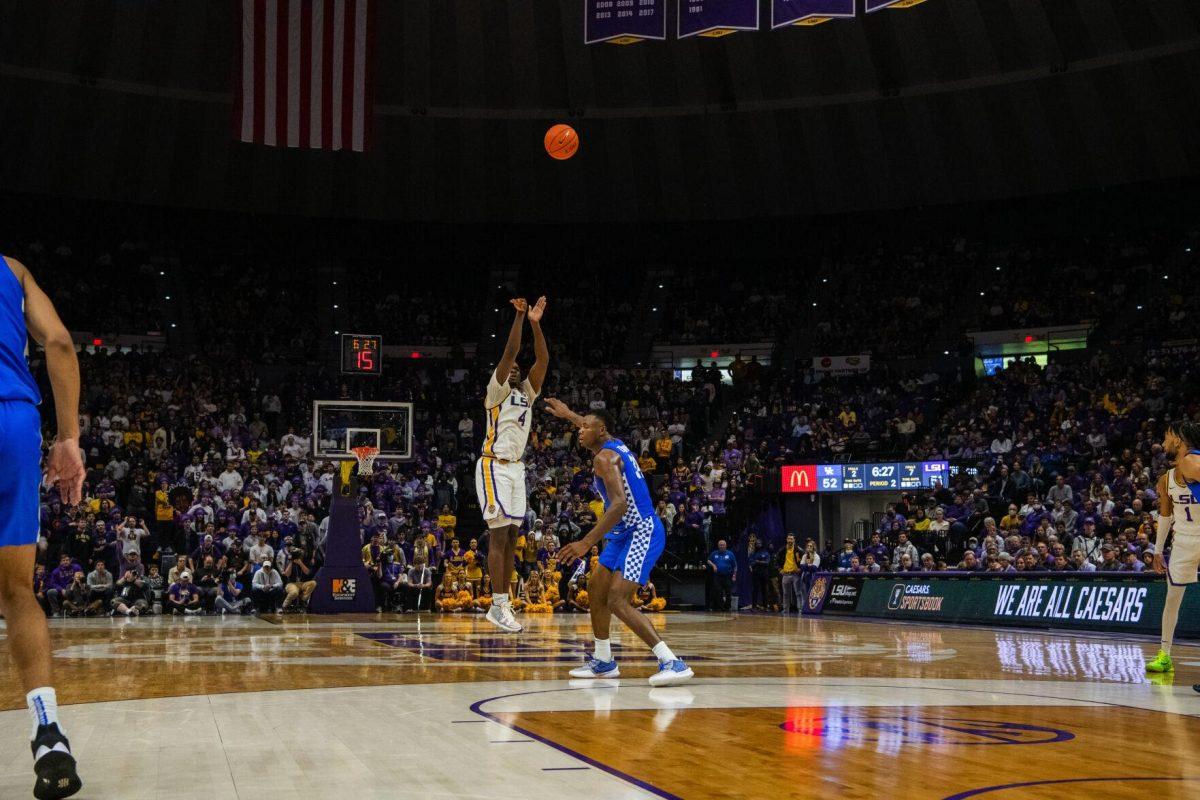 LSU men&#8217;s basketball senior forward Darius Days (4) shoots for three Tuesday, Jan. 04, 2022, during LSU&#8217;s 56-50 win against Kentucky in the Pete Maravich Assembly Center on North Stadium Drive in Baton Rouge, La.