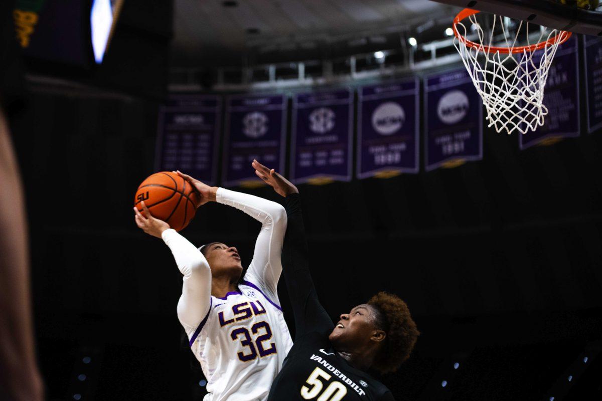 LSU women&#8217;s basketball fifth year senior forward and guard Awa Trasi (32) goes up for a shot over Vanderbilt women&#8217;s basketball junior forward Kaylon Smith (50) Sunday, Jan. 16, 2022, during LSU&#8217;s 82-64 win against Vanderbilt in the Pete Maravich Assembly Center on North Stadium Drive in Baton Rouge, La. Drive in Baton Rouge, La.