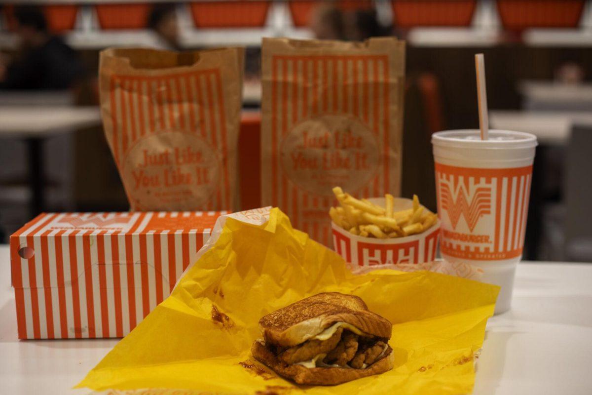 A Honey BBQ Chicken Strip Sandwich resides on a table along with other orders Tuesday, Jan. 18, 2022, at Whataburger on 5851 Creek Centre Dr. in Baton Rouge, La.