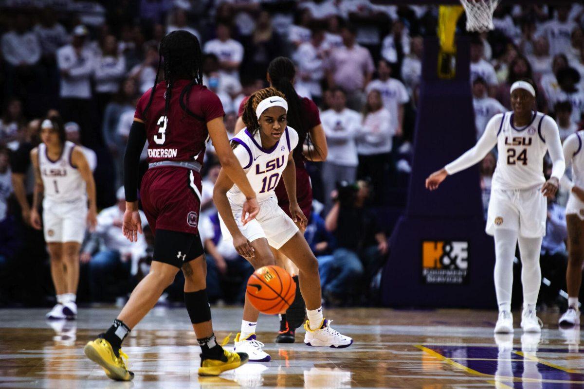 LSU women’s basketball senior guard Ryann Payne (10) focuses intently on the ball Thursday, Jan. 06, 2022, during LSU’s 66-60 loss against South Carolina in the Pete Maravich Assembly Center on North Stadium Drive in Baton Rouge, La.