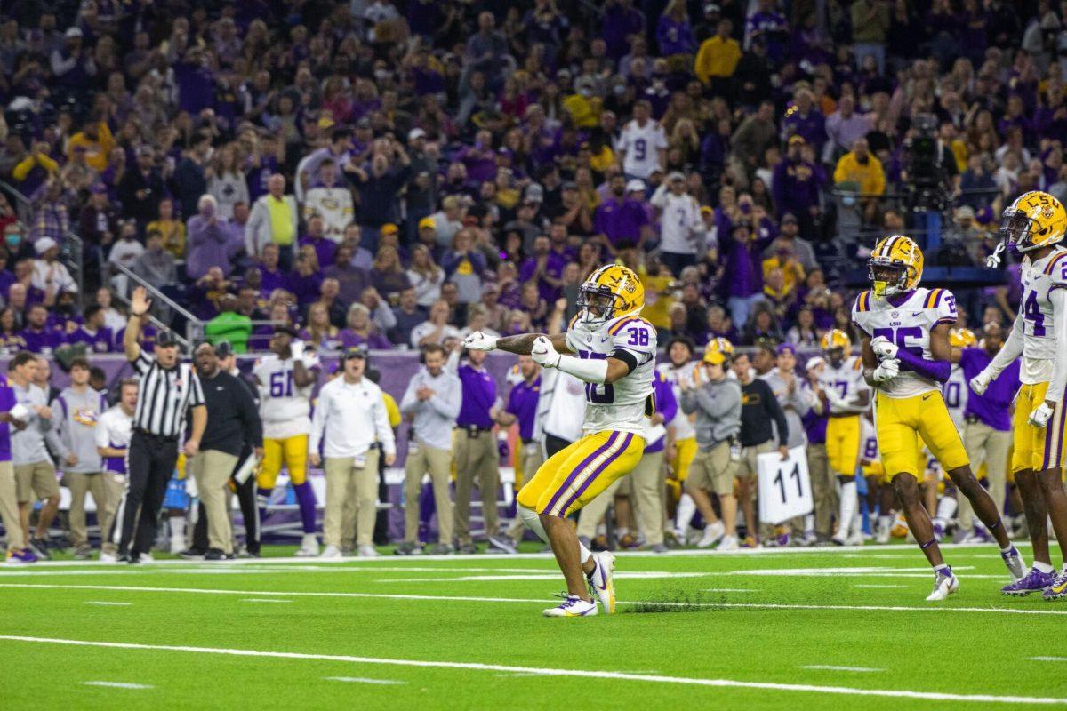 LSU football freshman defensive back Pig Cage (38) beats his chest Tuesday, Jan. 4, 2022, after tackling for a loss of yards Tuesday, Jan. 4, 2022during LSU&#8217;s 42-20 loss against Kansas State at NRG Stadium in Houston, TX.