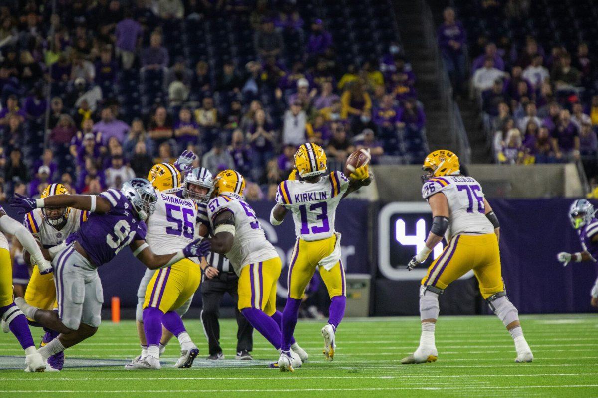 LSU football senior wide receiver Jontre Kirklin (13) launches the ball downfield Tuesday, Jan. 4, 2022, during LSU&#8217;s 42-20 loss against Kansas State at NRG Stadium in Houston, TX.