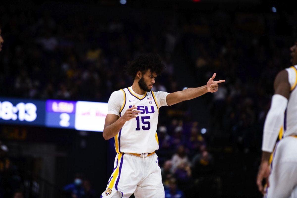 LSU men’s basketball freshman center Efton Reid (15) pints to the Arkansas bench after scoring Jan. 15, 2022, during LSU’s 65-58 loss against Arkansas in the Pete Maravich Assembly Center on North Stadium Drive in Baton Rouge, La.