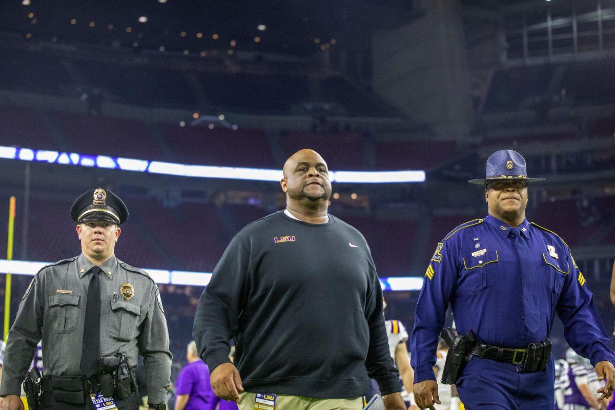 LSU football interim head coach Brad Davis leaves the field Tuesday, Jan. 4, 2022, during LSU&#8217;s 42-20 loss against Kansas State at NRG Stadium in Houston, TX.