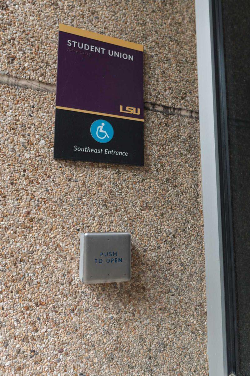 A &#8220;Push to Open&#8221; button sits on the wall on Monday, Jan. 24, 2022, outside the LSU Student Union on South Campus Drive in Baton Rouge, La.