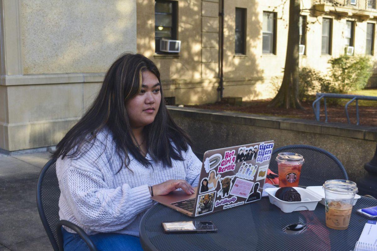 LSU English Literature freshman Jadalyn Souvannasy works on her homework Tuesday, Jan. 18, 2022, outside Barnes and Nobles on 2 Union Square in Baton Rouge, La.