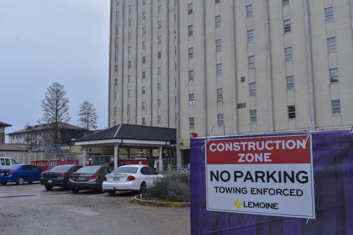 A construction zone sign is posted outside of the back main entrance of Kirby Smith Hall on Monday, Jan. 24, 2022, on Aster Street at LSU.