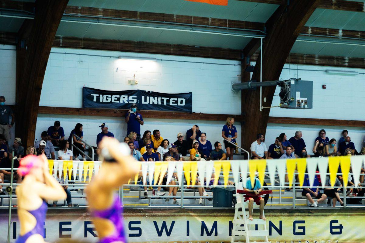 The "Tigers United" sign hangs behind the LSU swim and dive bleachers Saturday, Oct. 9, 2021, during LSU's win over GCU at the LSU Natatorium in Baton Rouge, La.