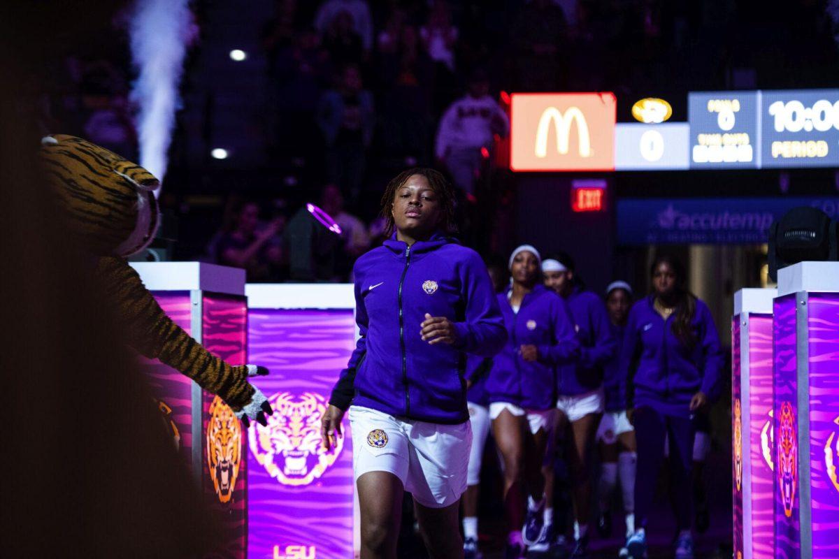 LSU women’s basketball freshman guard Timia Ware (21) runs out with the rest of the women’s basketball team during introductions Thursday, Jan. 13, 2022, before LSU’s 87-85 overtime win against Missouri in the Pete Maravich Assembly Center on North Stadium Drive in Baton Rouge, La.