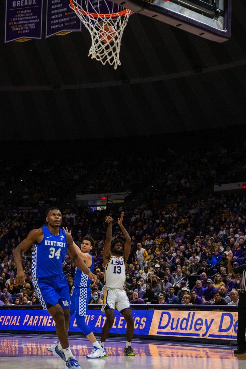 LSU men&#8217;s basketball sophomore forward Tari Eason (13) shoots a 3-pointer Tuesday, Jan. 04, 2022, during LSU&#8217;s 56-50 win against Kentucky in the Pete Maravich Assembly Center on North Stadium Drive in Baton Rouge, La.