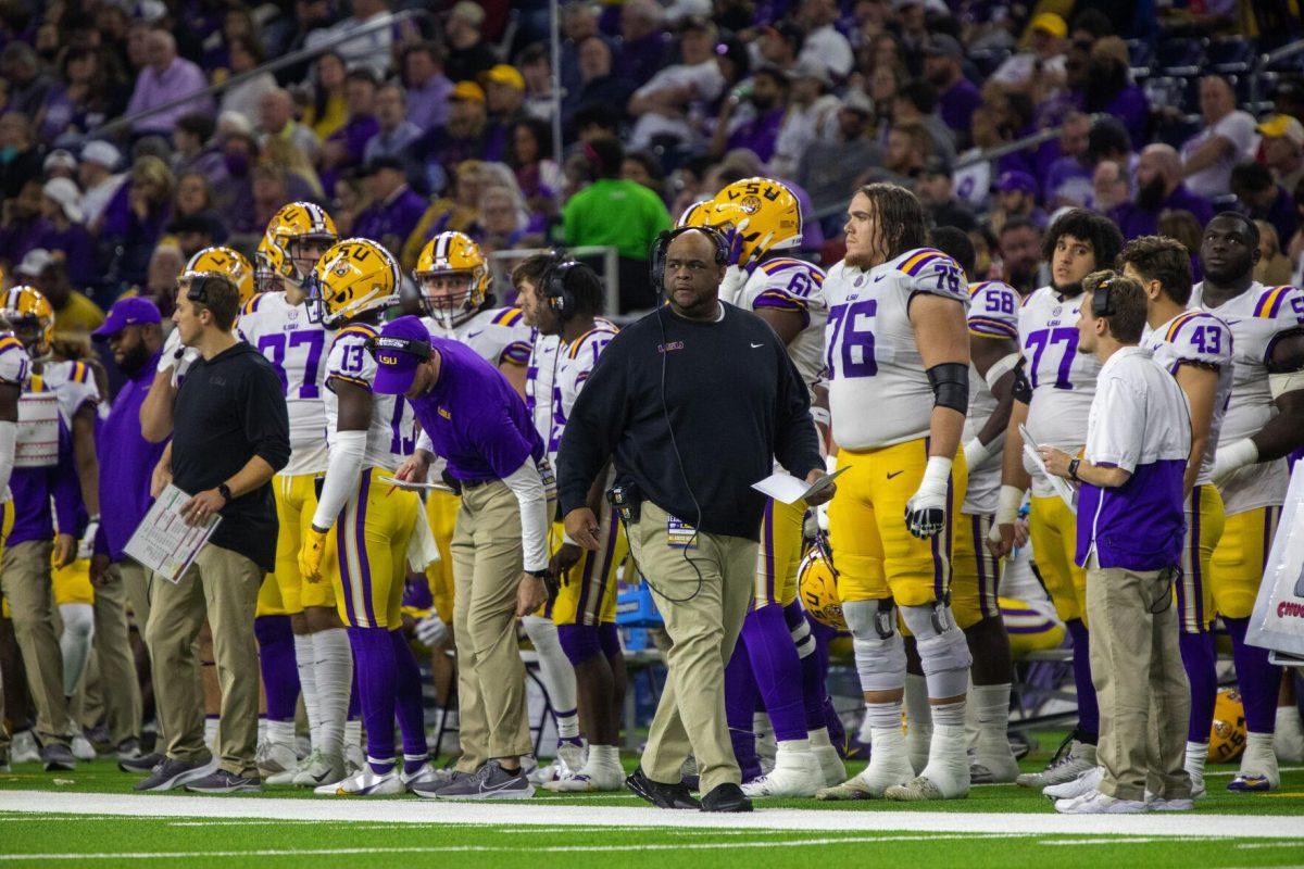 LSU football interim head coach Brad Davis follows the drive on the sideline Tuesday, Jan. 4, 2022, during LSU&#8217;s 42-20 loss against Kansas State at NRG Stadium in Houston, TX.